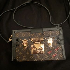 Woman’s designer look purse